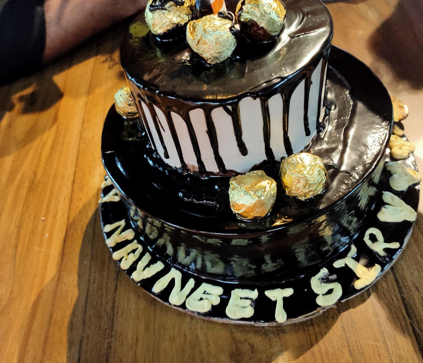 A birthday cake cut in the office